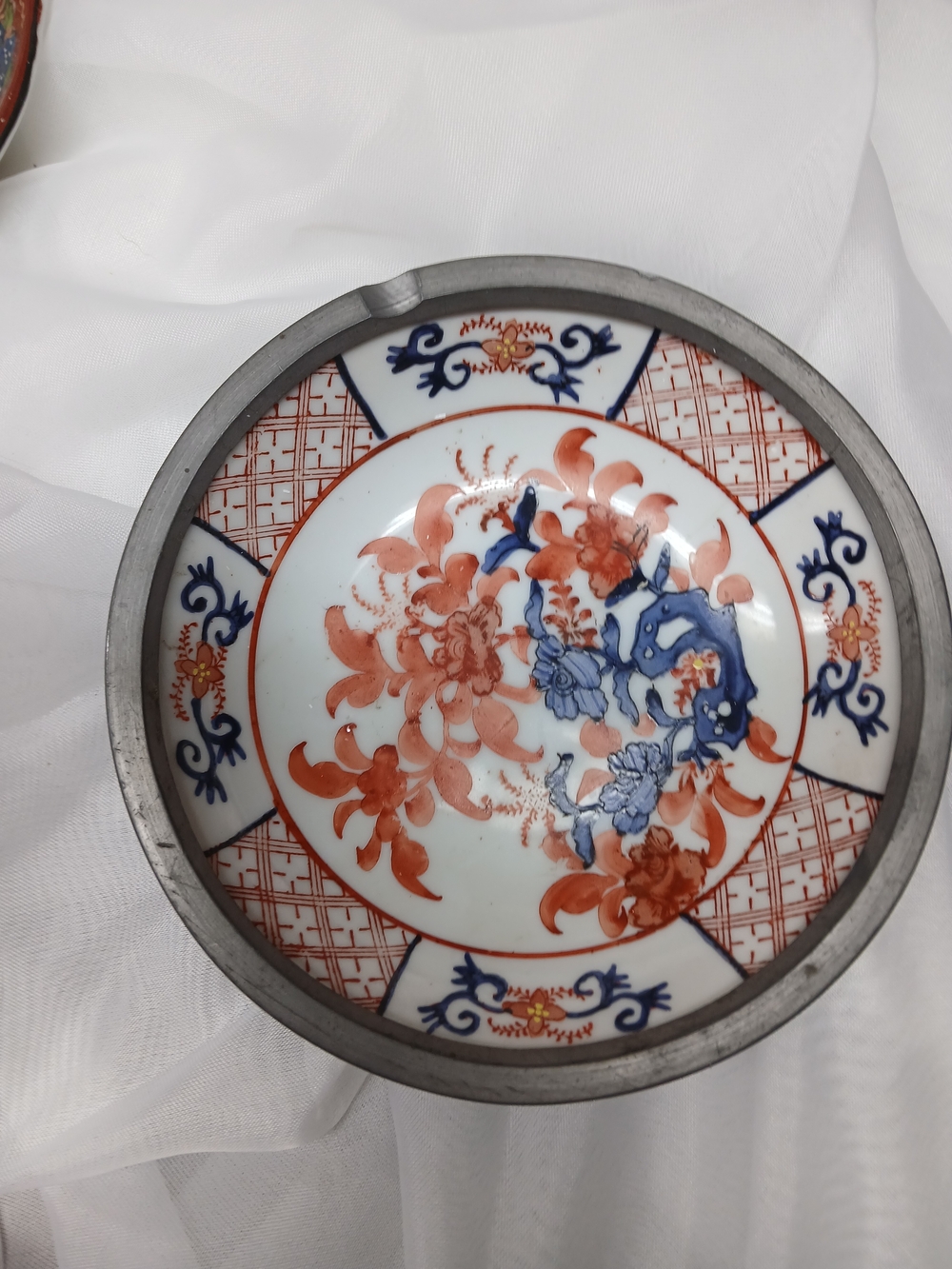 Decorative Porcelain Plate with Orange and Blue Floral Design